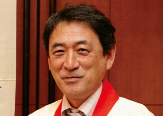 佐藤毅さんの顔写真です。